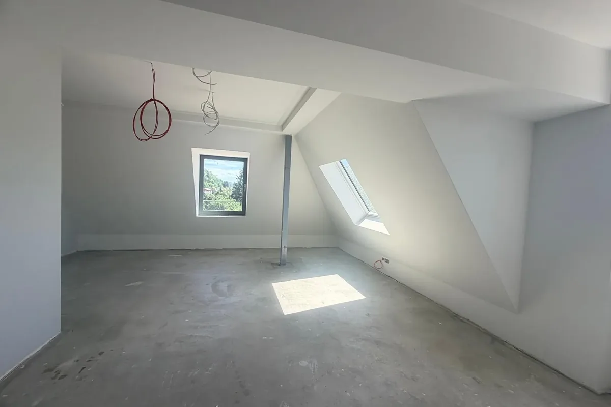 Ausgebautes Dachgeschoss mit neuen Trockenbauwänden